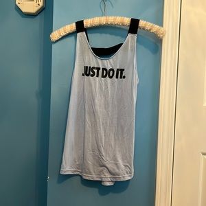 A sporty tank top that is perfect for workouts and has elastic straps.